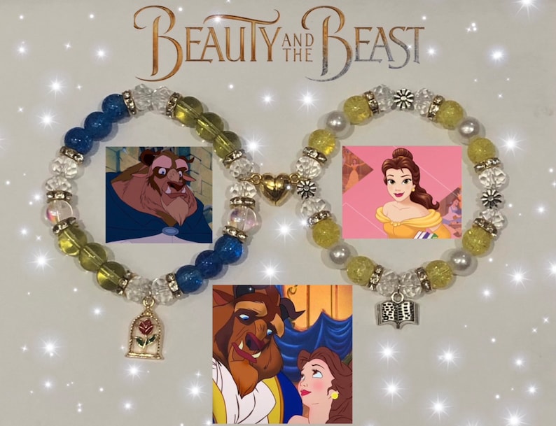 May include: Two beaded bracelets with charms. One bracelet is blue and yellow with a charm of a rose in a glass dome. The other bracelet is yellow with a charm of an open book. The bracelets are displayed on a white background with the text "Beauty and the Beast".