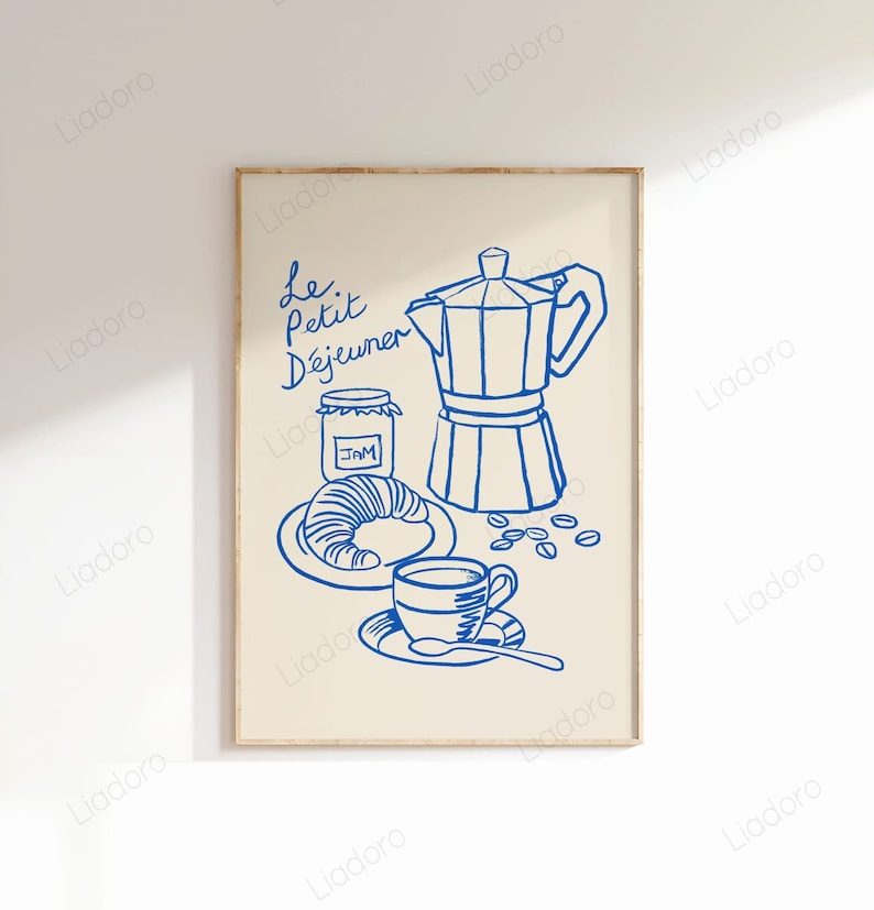 May include: A blue line drawing of a French breakfast scene with a coffee pot, a croissant, a jar of jam, a cup of coffee, and the text "Le Petit D&eacute;jeuner".