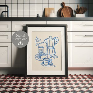 May include: A blue and white illustration of a French breakfast scene with a coffee pot, a croissant, a jar of jam, a cup of coffee, and a spoon. The text "Le Petit D&eacute;jeuner" is written in blue above the illustration.