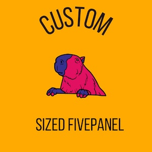 May include: Custom sized five panel cap featuring a pink and blue capybara illustration. The cap is on a yellow background with the word "CUSTOM" in black above the capybara and the words "SIZED FIVEPANEL" in black below the capybara.