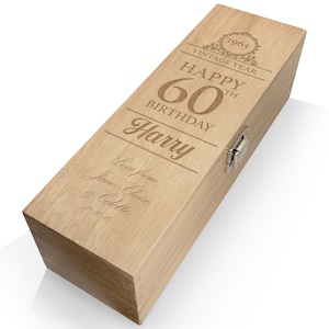 May include: A wooden wine box with an engraved message that reads "1963 Vintage Year Happy 60th Birthday Harry Love from Jane Claire & Colette XXX".