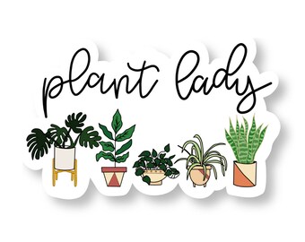 May include: A sticker with the text "plant lady" in black cursive font. Five potted plants are lined up below the text. The plants are a monstera, a fern, a pothos, a spider plant, and a snake plant. The pots are all different colors and patterns.