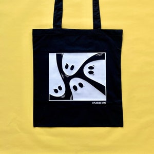 Spooky Tote Bag | Reusable canvas tote bag. Black bag with glow in the dark flex vinyl | Studio Kay