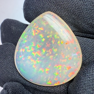 39 Carats Ethiopian Opal Pear Shaped Gemstone , Natural Opal Pear Cabochon , Natural Opal , Flat Opal For Jewelry