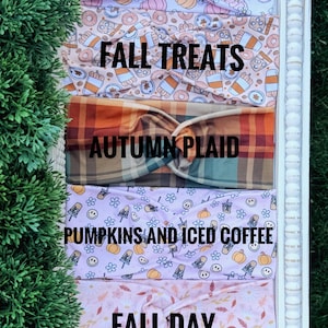 May include: Five fabric headbands with twisted knots. The top features pumpkins, followed by fall treats, autumn plaid, pumpkins and iced coffee, and fall day patterns. Each headband is labeled with its respective name in bold black text.