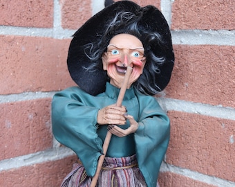 Decorative vintage kitchen witch to pose, old handmade good luck witch doll for decoration, witch brings luck