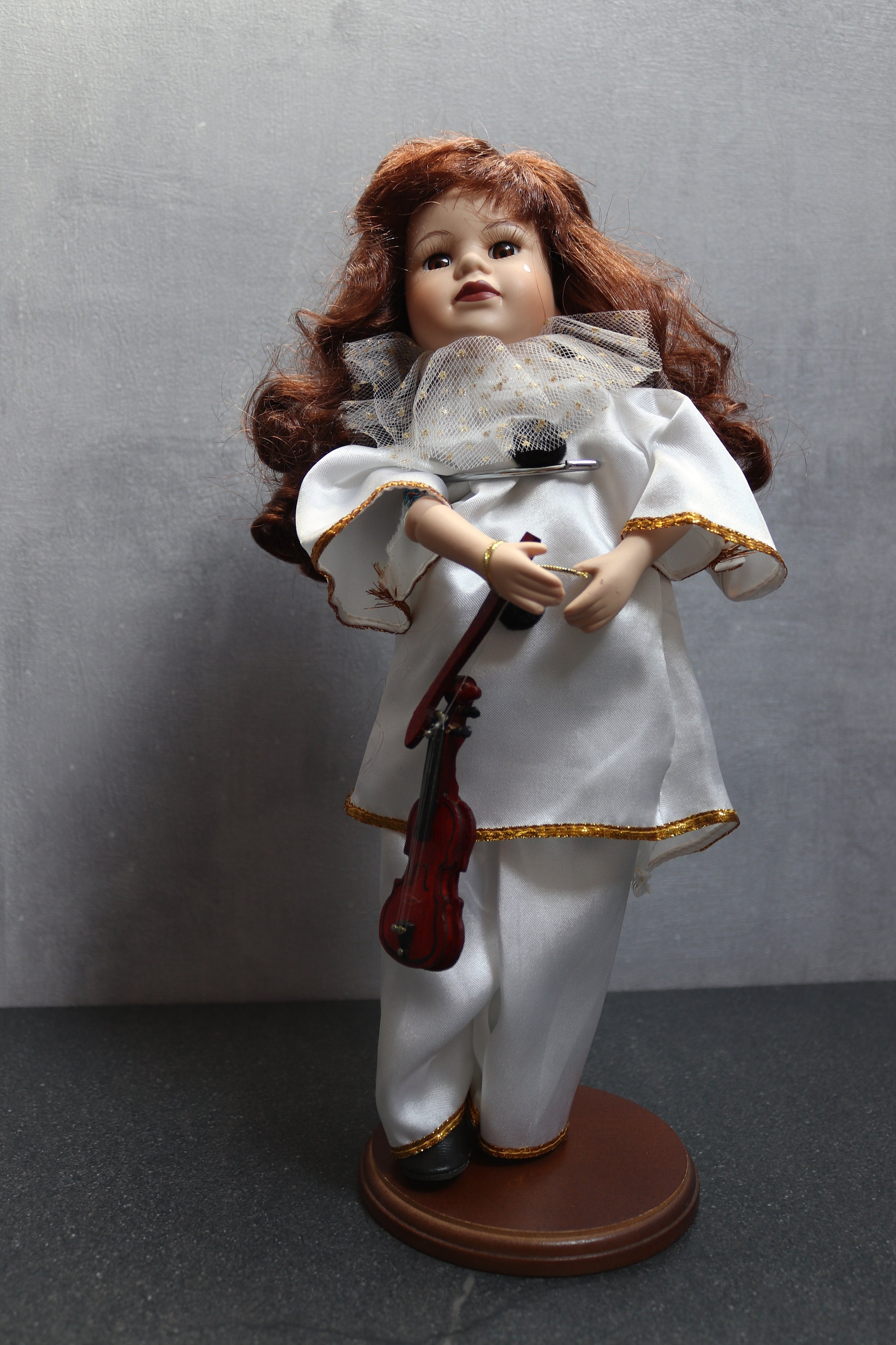 Ancienne poupée automate en porcelaine tricoteuse musicale - Décoration