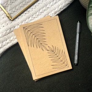 Quaderno floreale in carta riciclata (16,5x12 cm)