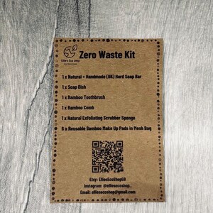 May include: A brown card with the text "Zero Waste Kit" and a list of eco-friendly products, including a hard soap bar, soap dish, bamboo toothbrush, comb, exfoliating sponge, and reusable makeup pads. The card also includes Etsy and Instagram information.