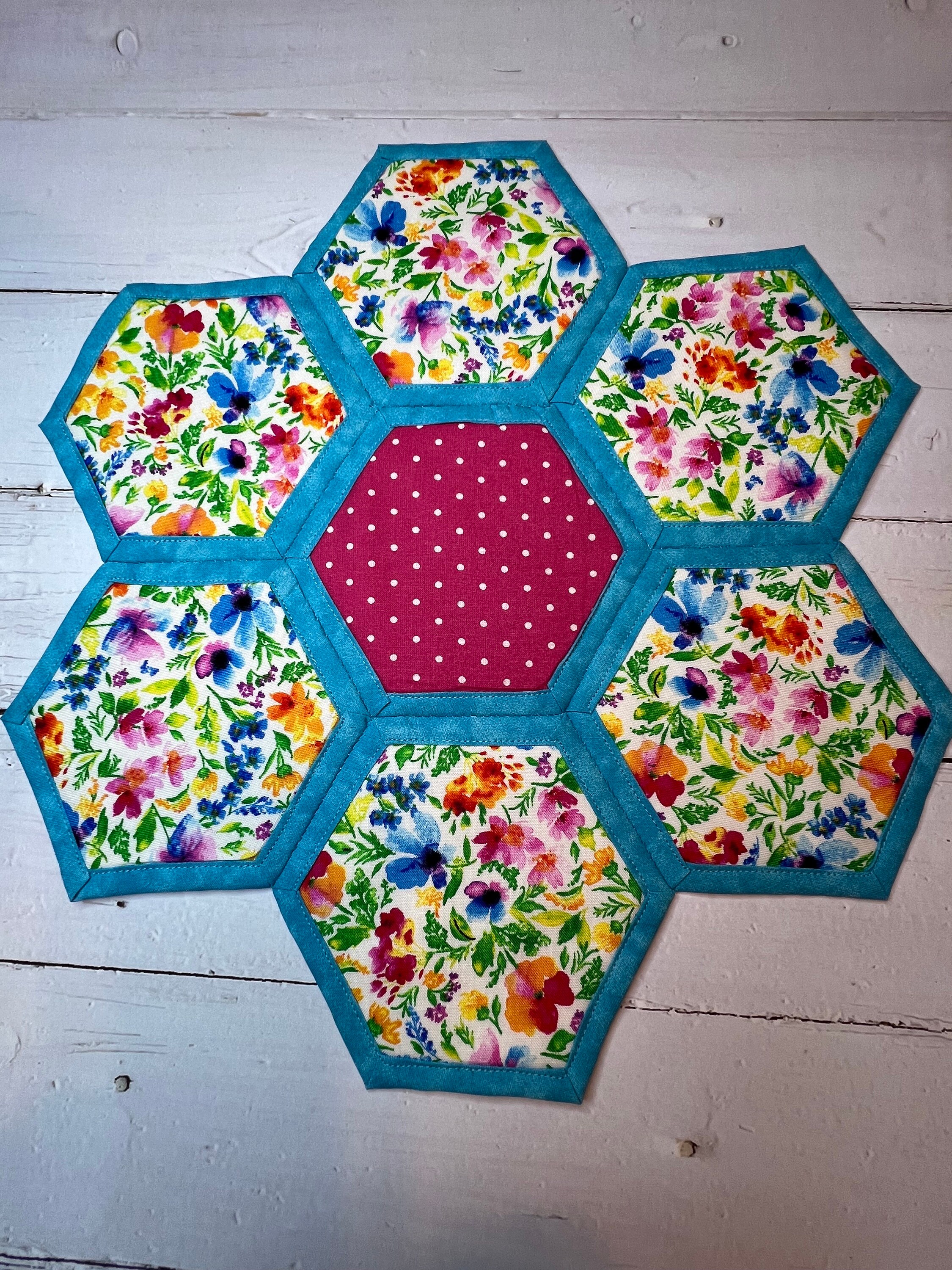 Winter Bloom Quilted Table Topper NCU0NTV111