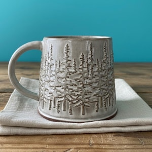 May include: A weathered wooden sign displaying the words "Welcome to our home" in white. The sign has a distressed appearance, creating a charming, welcoming feel for a front door or hallway.