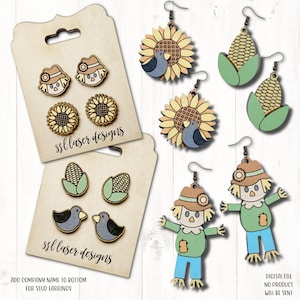 May include: A set of laser cut wooden earrings featuring fall themes. The earrings include scarecrows, sunflowers, corn, and birds. The earrings are available in a variety of colors and designs. The text "ssl laser designs" is printed on the cards.