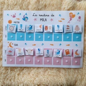 May include: A blue and pink chart with the words "La routine de Mila" at the top. The chart is divided into two sections: "Matin" and "Soir". Each section has a list of activities with corresponding images. The activities include "Se lever", "Aller aux toilettes", "Se laver les mains", "Prendre le petit d&eacute;jeuner", "S'habiller", "Se brosser les dents", "Mettre ses chaussures", "Enfiler sa veste", "Mettre le pyjama", "Diner", "Aller aux toilettes", "Se laver les mains", "Lire une histoire", "Se coucher".