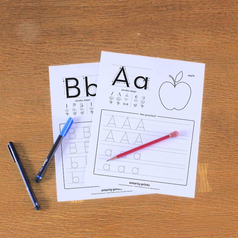 May include: Two printable worksheets for learning the letters A and B. The worksheets feature dotted lines for tracing the letters and a section for practicing writing the letters. The A worksheet includes an apple illustration and the B worksheet includes a heart illustration. The text "stroke steps" is included on both worksheets.
