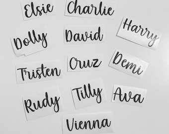 May include: A white background with 11 white labels with black text. The labels have the names Elsie, Charlie, Harry, Dolly, David, Cruz, Demi, Tristen, Rudy, Tilly, and Vienna.