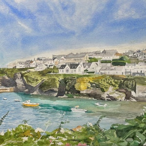 May include: A watercolor painting of a small coastal town with white buildings clustered on a cliff overlooking a bay. The water is a light blue and there are several boats in the bay. The sky is a light blue with white clouds.