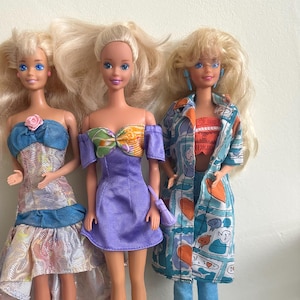 Lot of 3 Vintage 90s Barbie Dolls – Mixed Outfits & Accessories