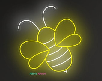 May include: Yellow neon bee sign with white outline, hanging on a dark gray wall above a yellow couch. The sign says "NEON MANIA" in small white letters.