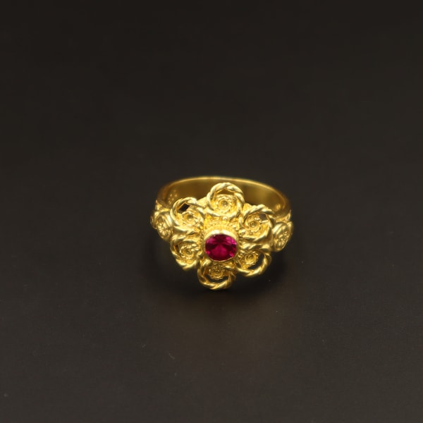 Greek ring with ruby gemstone