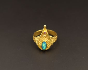 Byzantine ring with blue opal and ruby gemstone