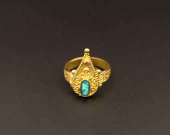 Bague byzantine avec opale bleue et rubis