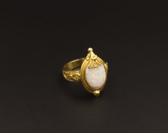 Greek ring with white opal gemstone