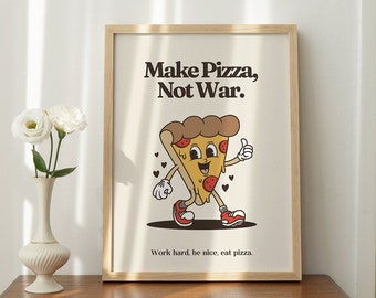 May include: A framed print with a cartoon pizza slice character. The text on the print reads "Make Pizza, Not War."  The text below the character reads "Work hard, be nice, eat pizza."