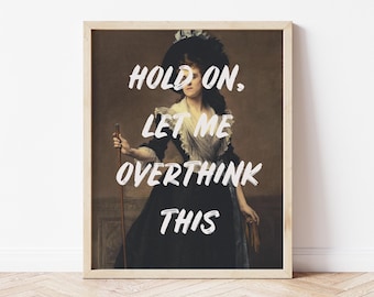Puede incluir: Una impresión enmarcada con una pintura de una mujer con un vestido y un sombrero. El texto "HOLD ON, LET ME OVERTHINK THIS" está escrito en blanco en la impresión.