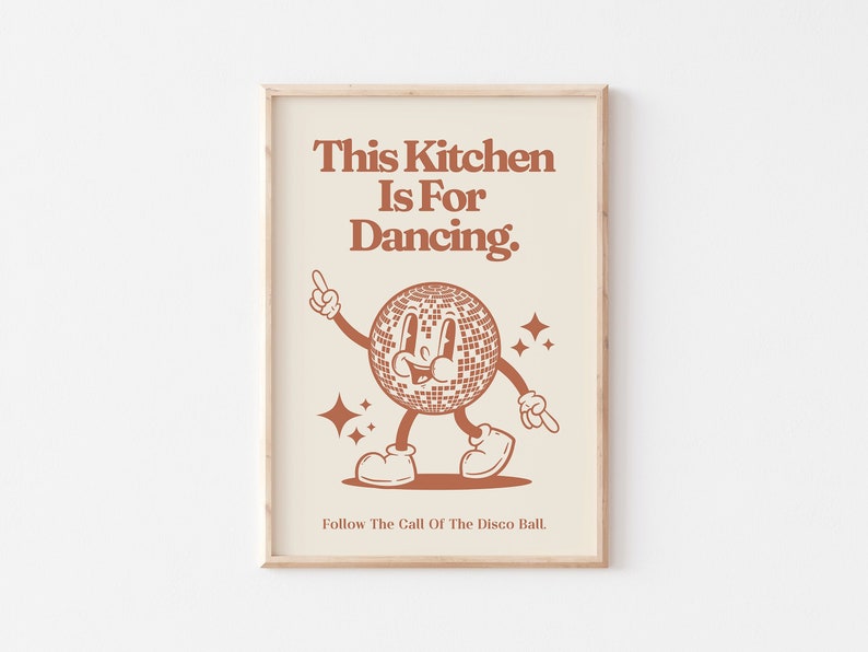 May include: A brown and white kitchen print with a disco ball character and the text "This Kitchen Is For Dancing. Follow The Call Of The Disco Ball."