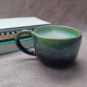 Green and Black Ceramic Mug