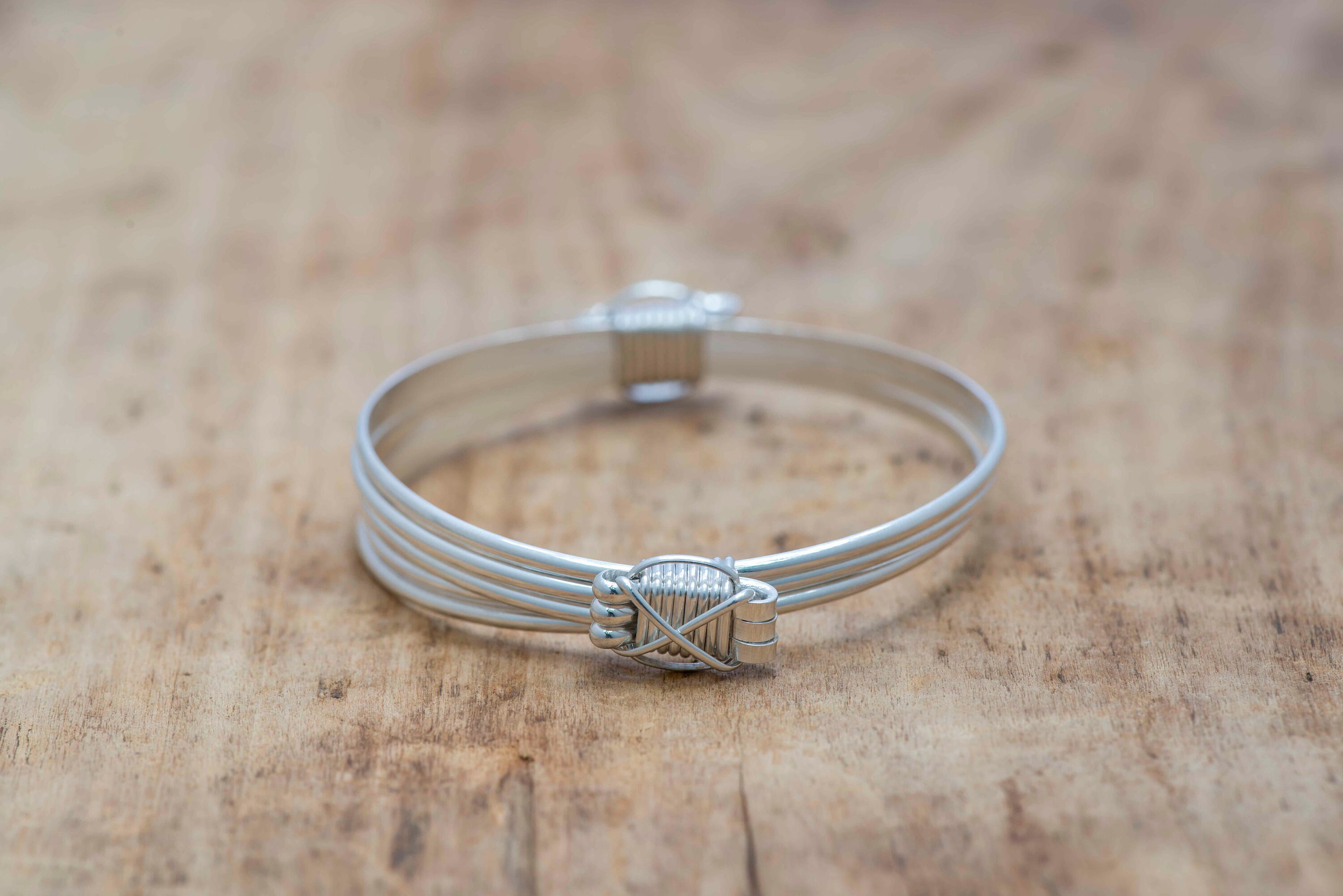 Four Knot 9 Strand Elephant Hair Bangle in Sterling Silver w/ Story Ca –  The Zuri Collection