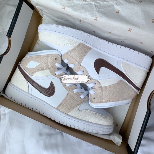 cream and blue jordan 1