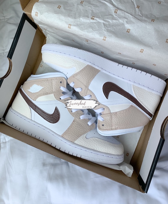 cream nike jordans