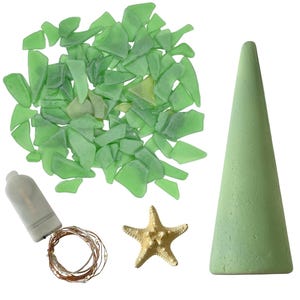 May include: A collection of craft supplies including green sea glass pieces, a light green cone, a gold starfish, and a string of fairy lights with a battery pack. The items are arranged on a white background.