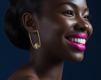 Gilded bronze earrings with Baoulé-NHYIRA weights