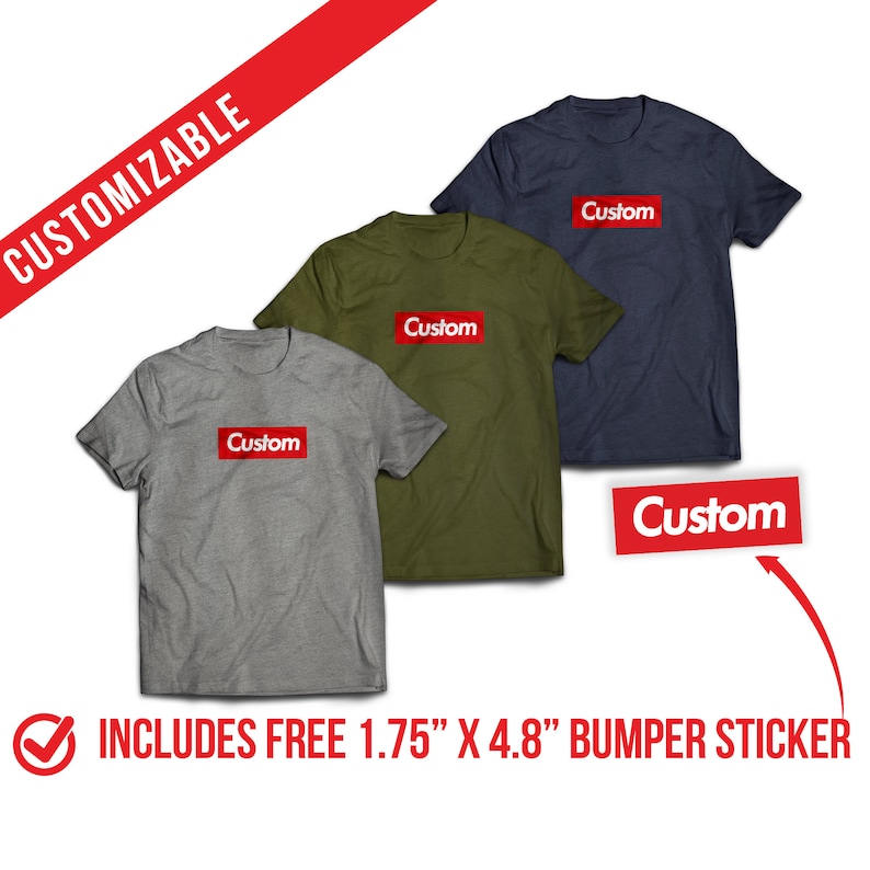 May include: Three t-shirts in different colors, gray, green, and blue, with a red box on the front that says "Custom". A red bumper sticker with the same text is also included.