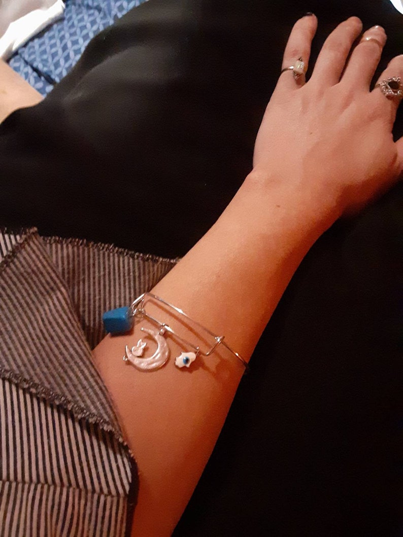 Cuffcharm bracelet stainless steel cat and moon with polished blue howlite and white hasma charm