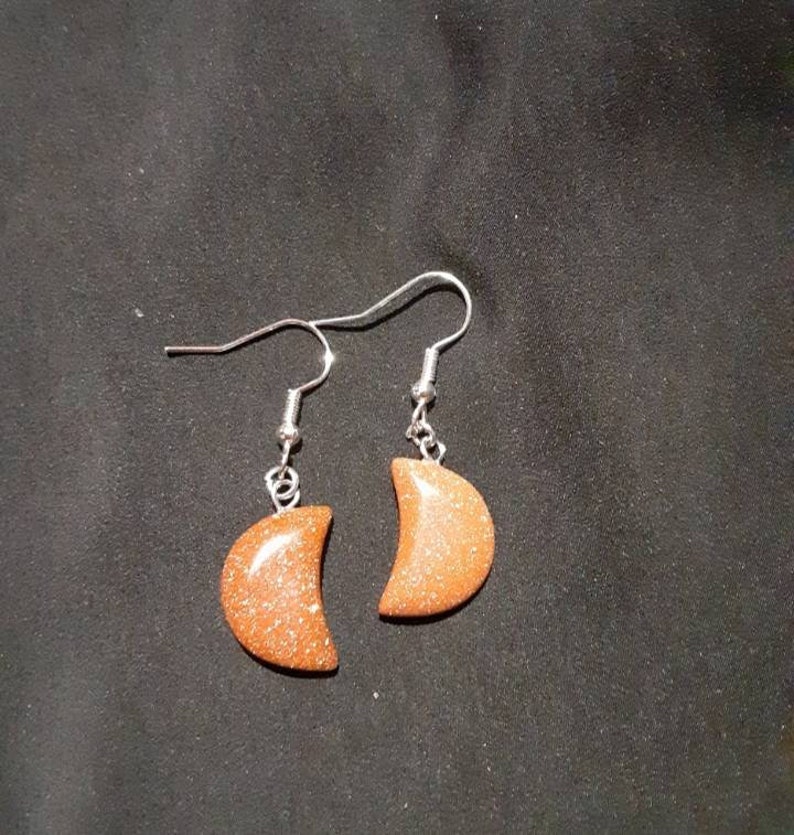 Goldstone crescent moon shaped earrings