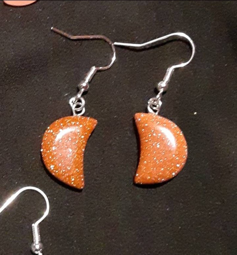 Goldstone crescent moon shaped earrings