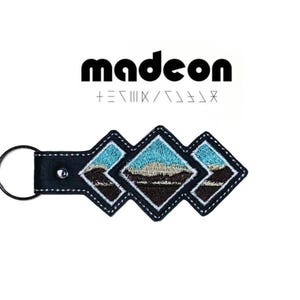 Madeon Adventure logo embroidered key tag