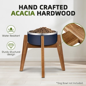 May include: A dark blue pet bowl filled with brown kibble sits on a light brown acacia hardwood stand with four legs. Text reads HAND CRAFTED ACACIA HARDWOOD, Water Resistant, Sturdy structural design, and *Dog Bowl not Included.