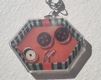 Ciondolo a forma di scatola di bottoni