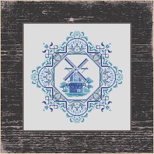 May include: Cross-stitch design featuring a blue windmill with a white background, framed by an ornate blue and teal border. The artwork is set against a distressed, dark wood-grain background, creating a vintage aesthetic.