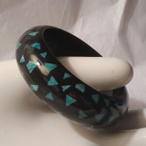 Vintage 1980's Black Resin Bangle Bracelet with Teal Geometric Triangles Scattered Throughout
