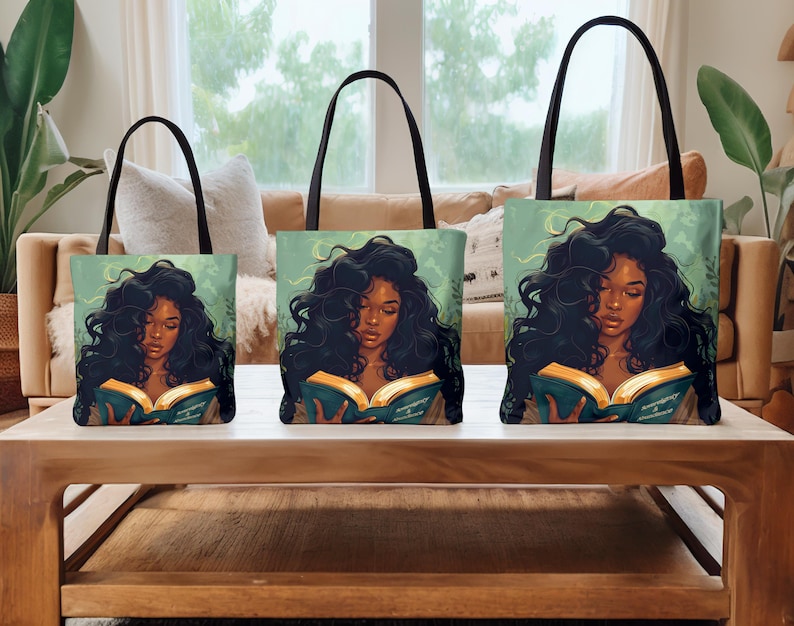 May include: Three tote bags of varying sizes, each featuring a woman with long, dark hair reading a book. The bags have black handles and a teal background. The woman is depicted with a serene expression.