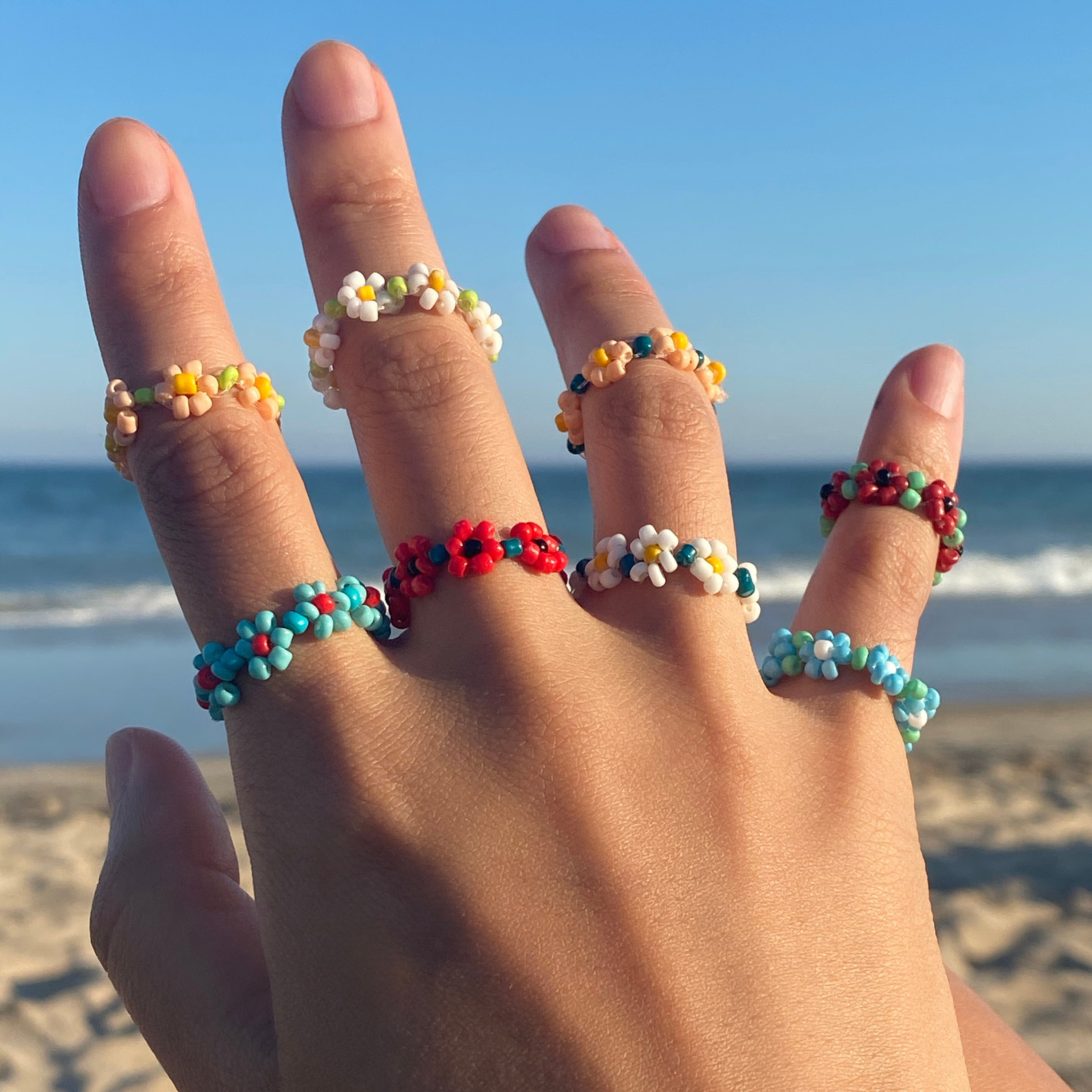 What size beads are used to make flower rings like these? : r/Beading