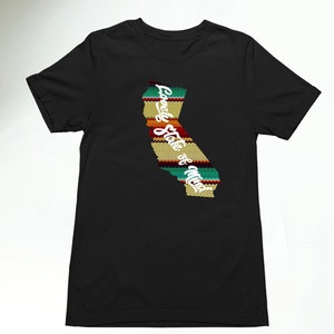 May include: Black t-shirt with a graphic of the state of California in a colorful striped pattern. The text "Golden State of Mind" is written on the graphic.