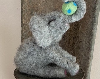 Needle felted wool, playful, calf, elephant, ball, trunk, sitting, gray, silly, happy, animal, zoo, handmade gifts