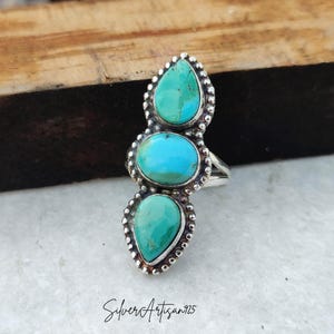 May include: A handmade wooden sign with the text "Welcome" in a playful font. The sign features a distressed white background and a dark brown border, perfect for a front door or entryway. The sign measures approximately 12 inches wide and 6 inches tall.