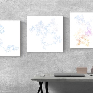 May include: Three framed abstract art prints with a white background and a blue, light blue, and multi-colored design.